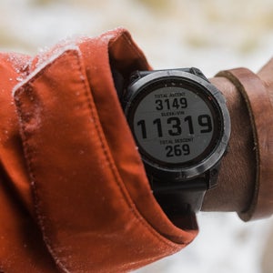 Close-up of hiker wearing a sport watch