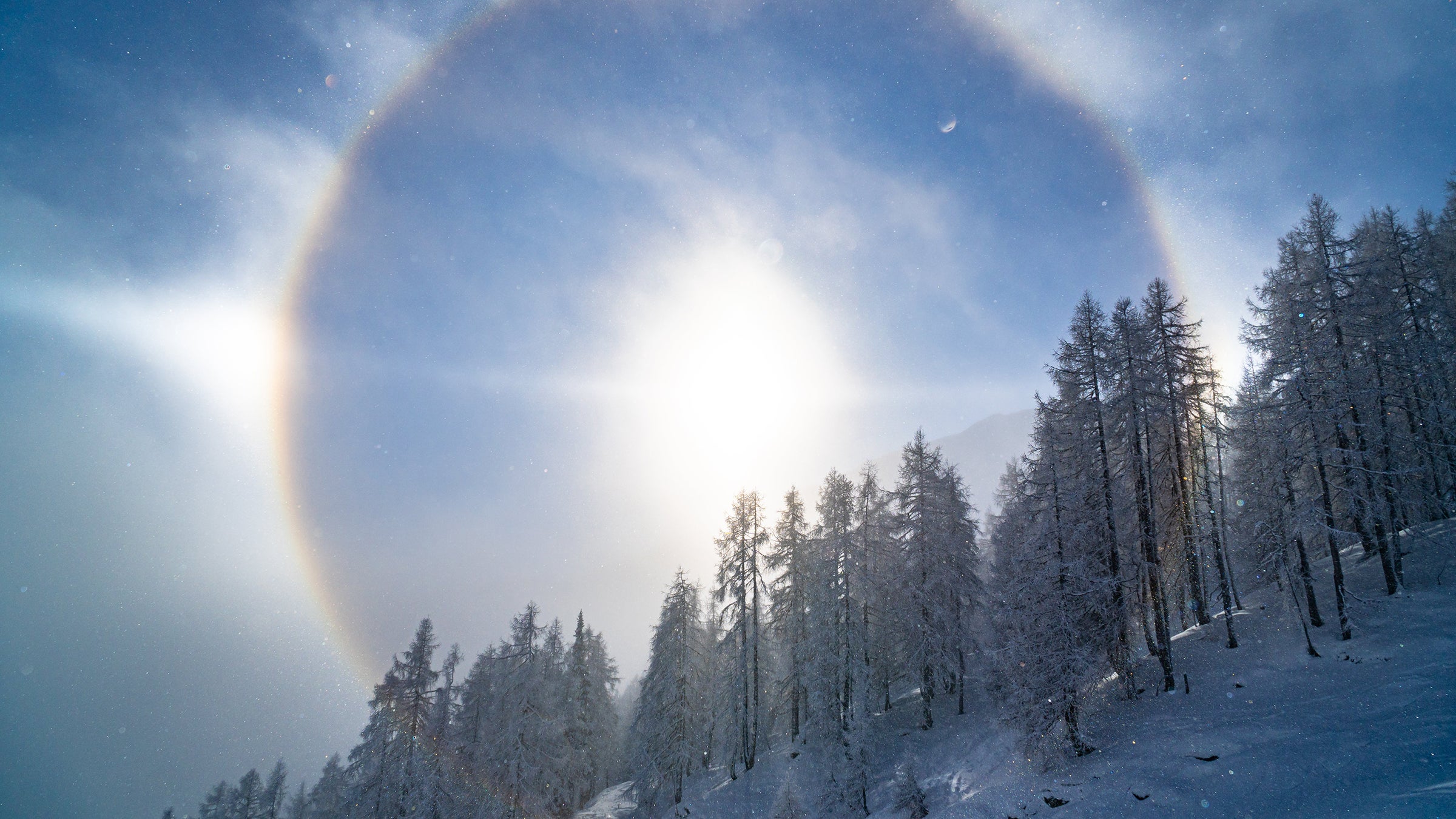 Sun glare photo of winter landscape