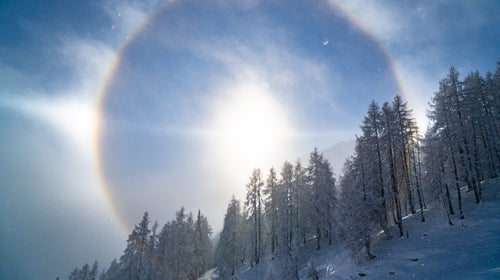 Sun glare photo of winter landscape