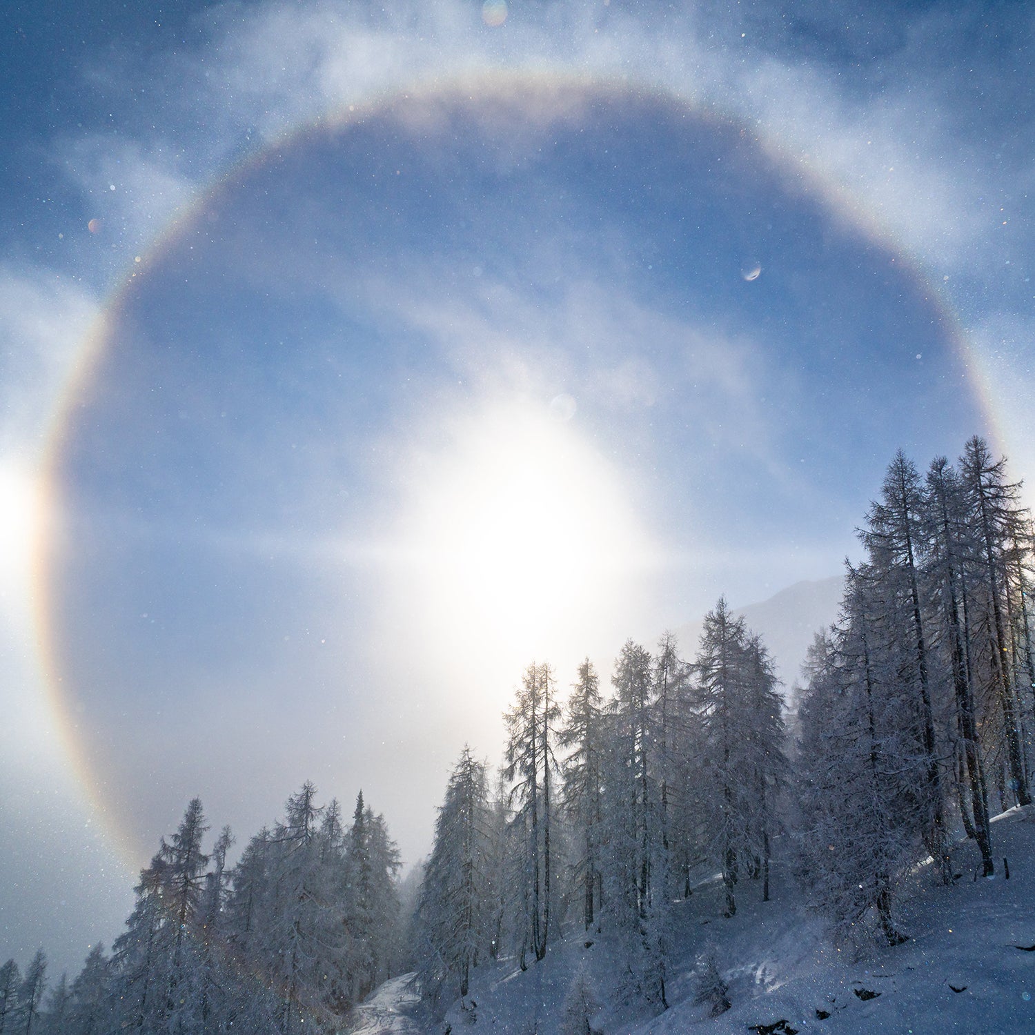 Sun glare photo of winter landscape