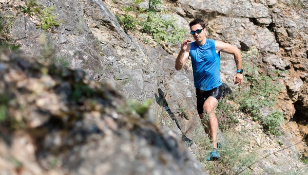 Trail runner wearing sunglasses