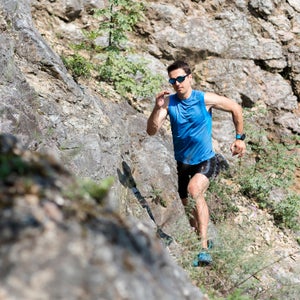 Trail runner wearing sunglasses