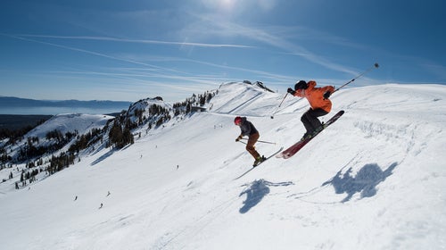 Skiers play and rip lines in Truckee, California mountains