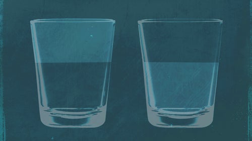 A half full glass of water next to a half empty glass of water