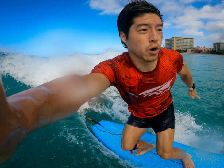 Wookie Kim surfing a wave