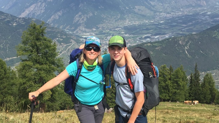 Kristin Hostetter and son hiking in Switzerland