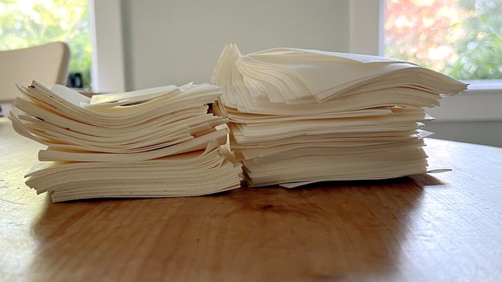 A stack of "eco-friendly" laundry strips that actually contain PVA plastic on a wooden table