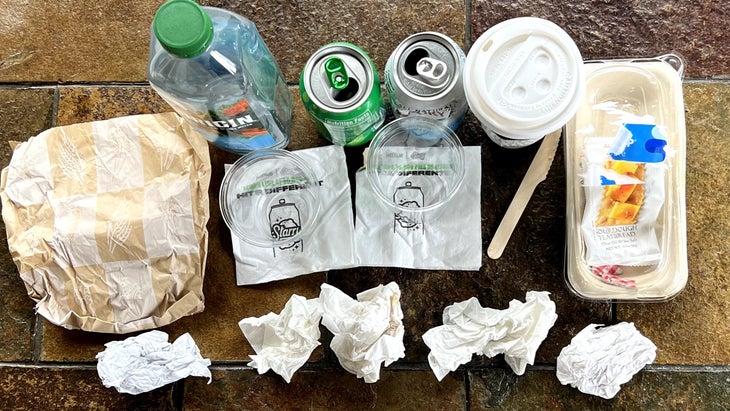 trash from one day of airline travel without a zero waste travel kit