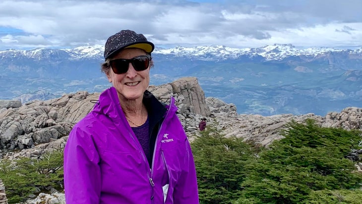 smiling woman in mountains