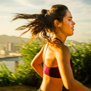 A woman runs in the heat