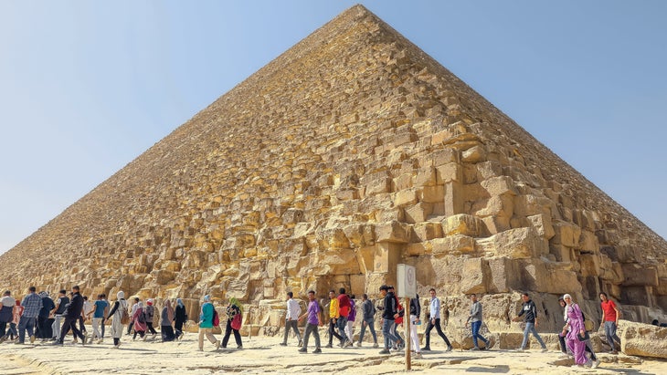 Tourists visit the Khufu Pyramid in Giza, Egypt
