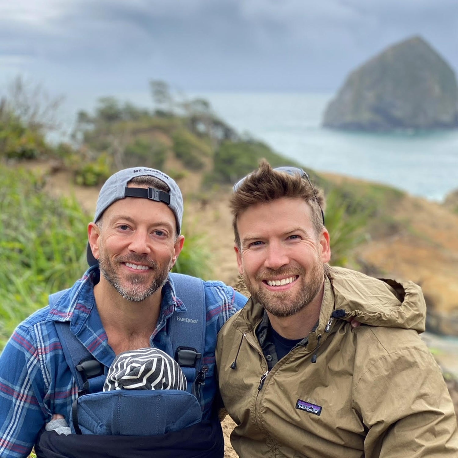 Kieron Wilde with his husband and child