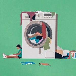 Illustration of a small person leaning against an oversized washing unit with clothes strewn about