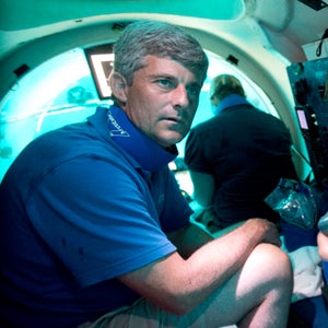 OceanGate CEO Stockton Rush, left, in one of his company's submersibles