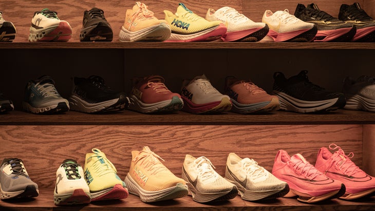 A store rack display with several shoes