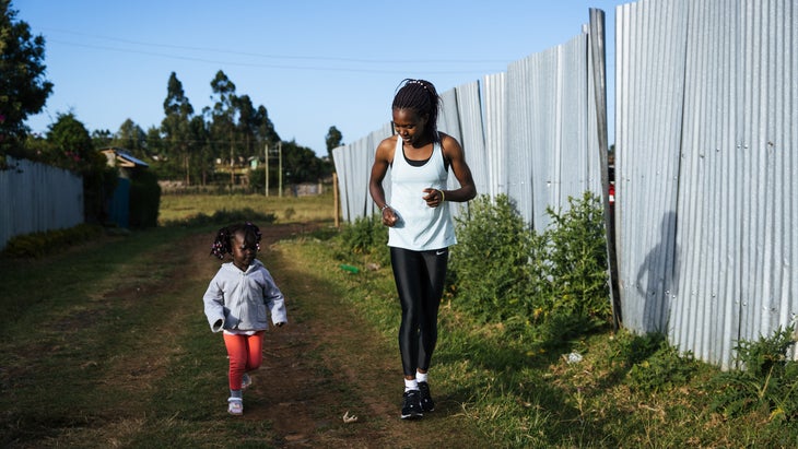 Faith Kipyegon running with her daughter in Kenya