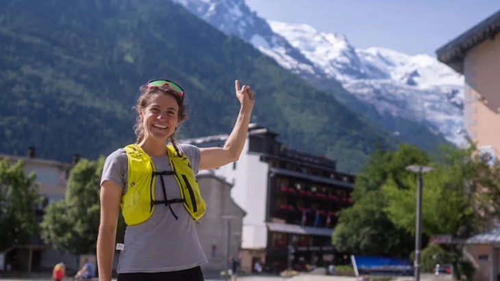 Gerardi points up to Mont Blanc from Chamonix with a yellow vest on