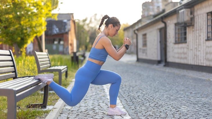 Woman does a split squat