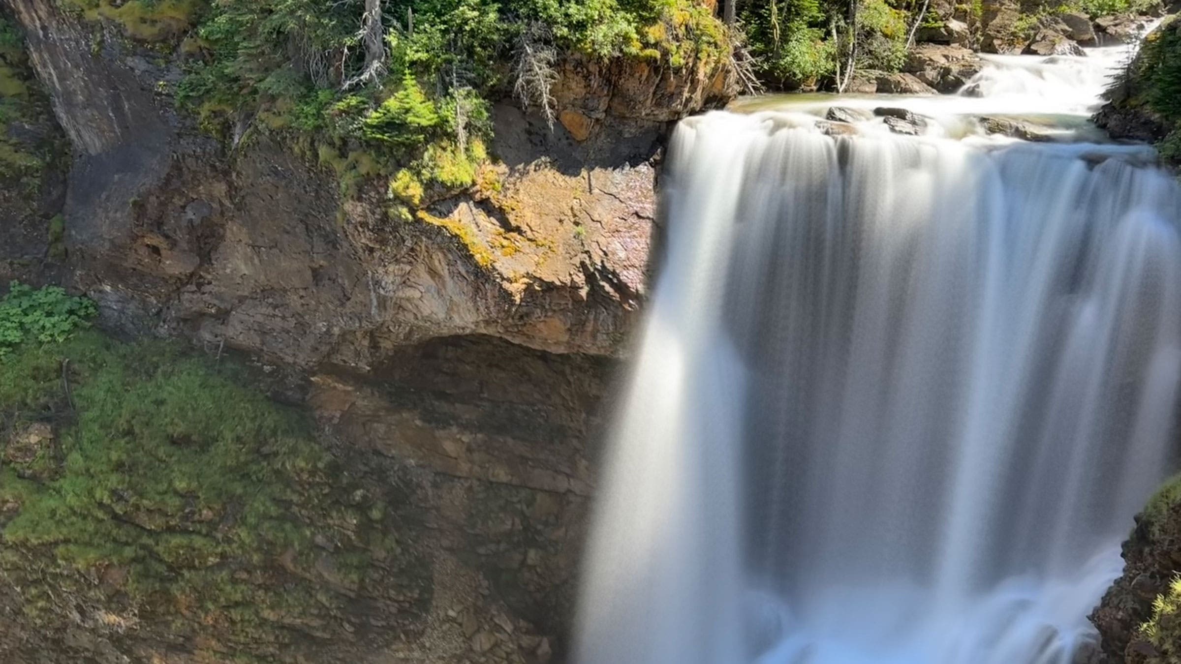waterfall on the continental divide trail in glacier national park
