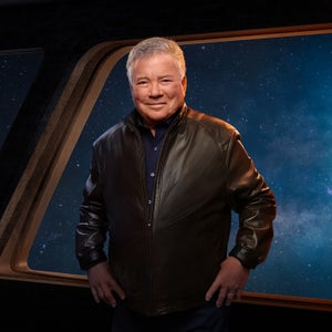 William Shatner in a rendering of a spaceship with Mars in the background