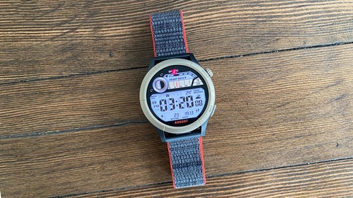 Amazfit Cheetah Pro watch on wood background