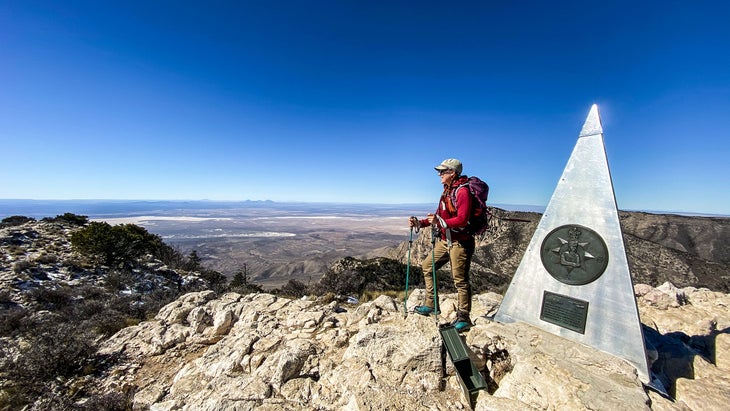 woman at the summit of Guadalupe Peak