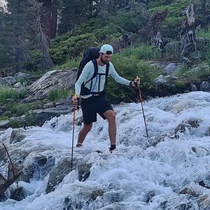 Belgian runner Karl Sabbe navigates a waterfall on foot.