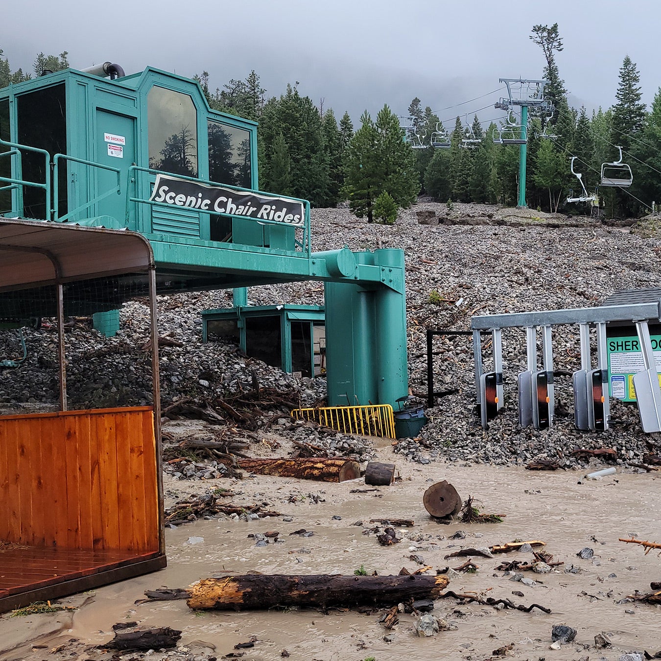 Rocks are piled high against a chairlift after a catastrophic landslide in Nevada