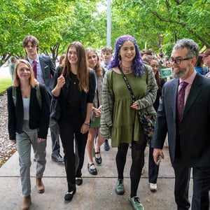 Sixteen kids leave a Montana courthouse after winning a landmark legal victory over climate change.