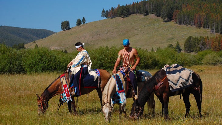 Native Americans on horseback at commemoration for battle on Nez Perce National Historic Trail
