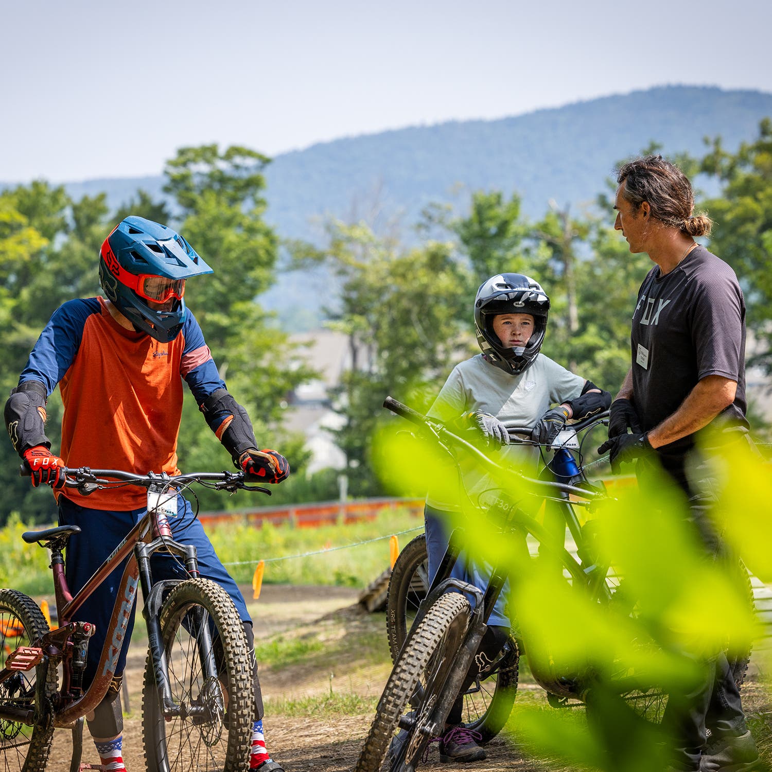 The author, in red, and his daughter get in some laps at Killington Bike Park.