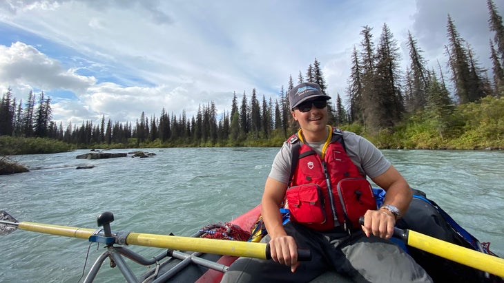 smiling man rafting