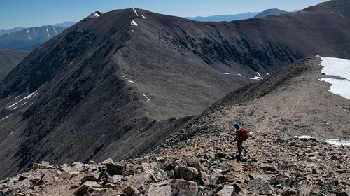 A hiker climbs Mount Democrat near Alma, Colorado.