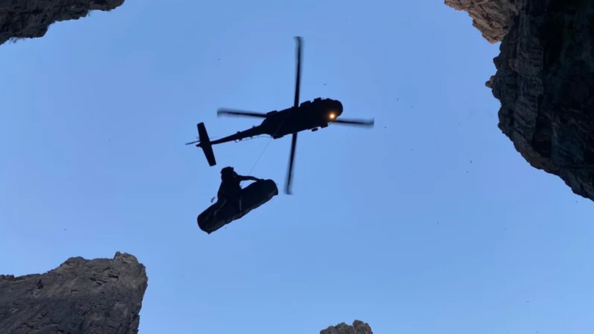 A helicopter long lines a victim out of the black canyon
