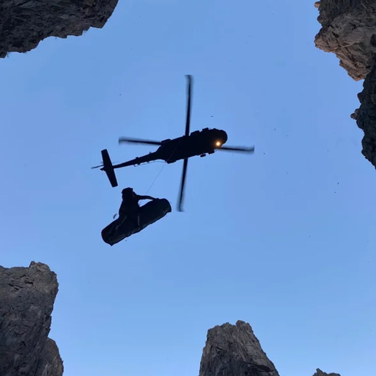 A helicopter long lines a victim out of the black canyon