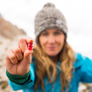 woman holding gummy bears