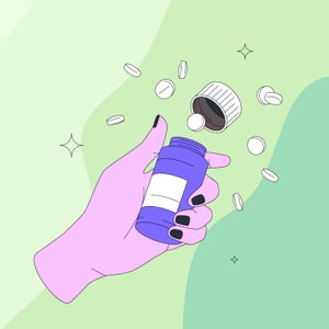 Female hand opening pills bottle. Orange pill container with scattering white tablets over a green background.