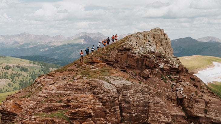 A group runs a ridge in colorado