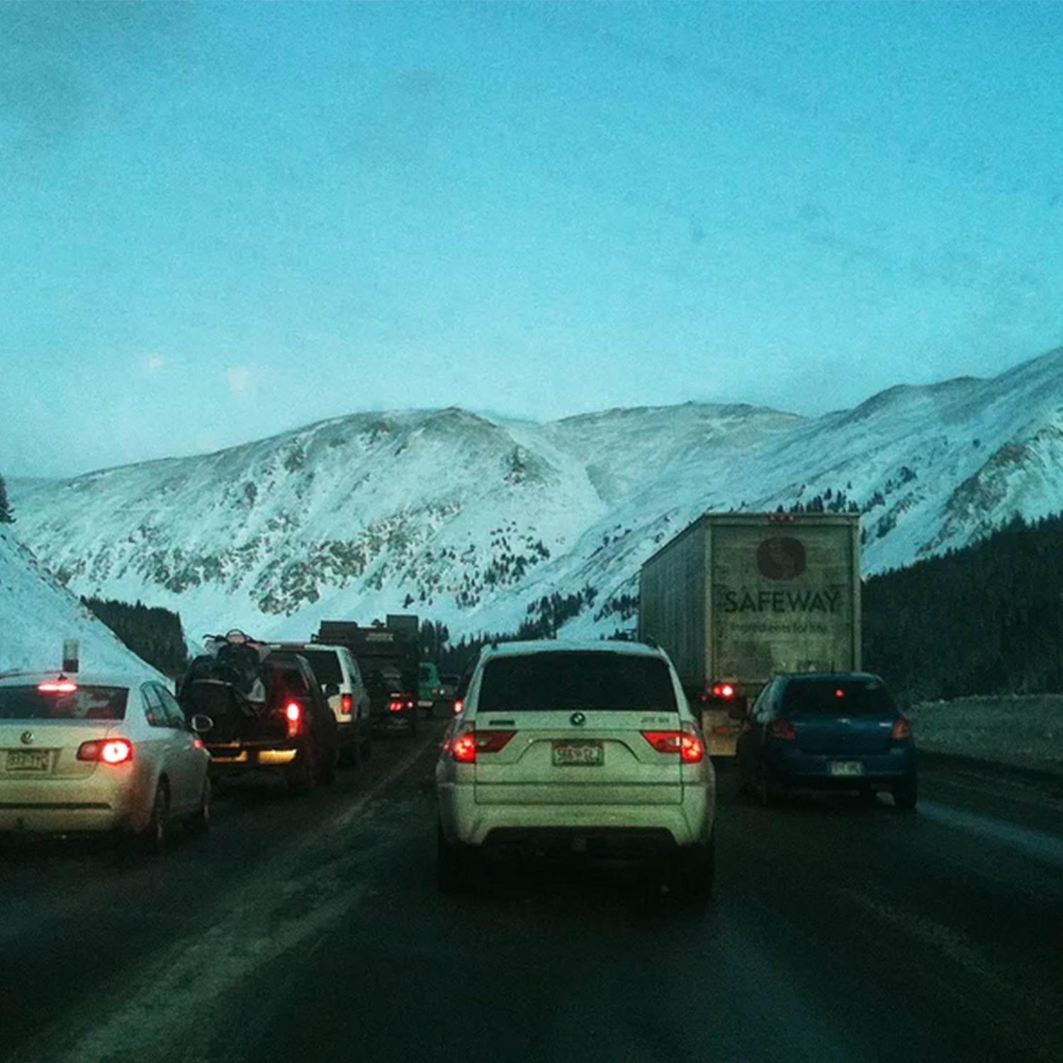 East bound I-70 traffic cues up as it nears the entrance to the Eisenhower Tunnel on Sunday, January 22, 2012. It had taken an hour and a half to travel up from Silverthorne to the tunnel. A program that uses police pace cars to reduce traffic congestion on Interstate 70 in the mountains this winter was suspended after too many skiers and other mountain visitors jammed the highway, creating a bottleneck.