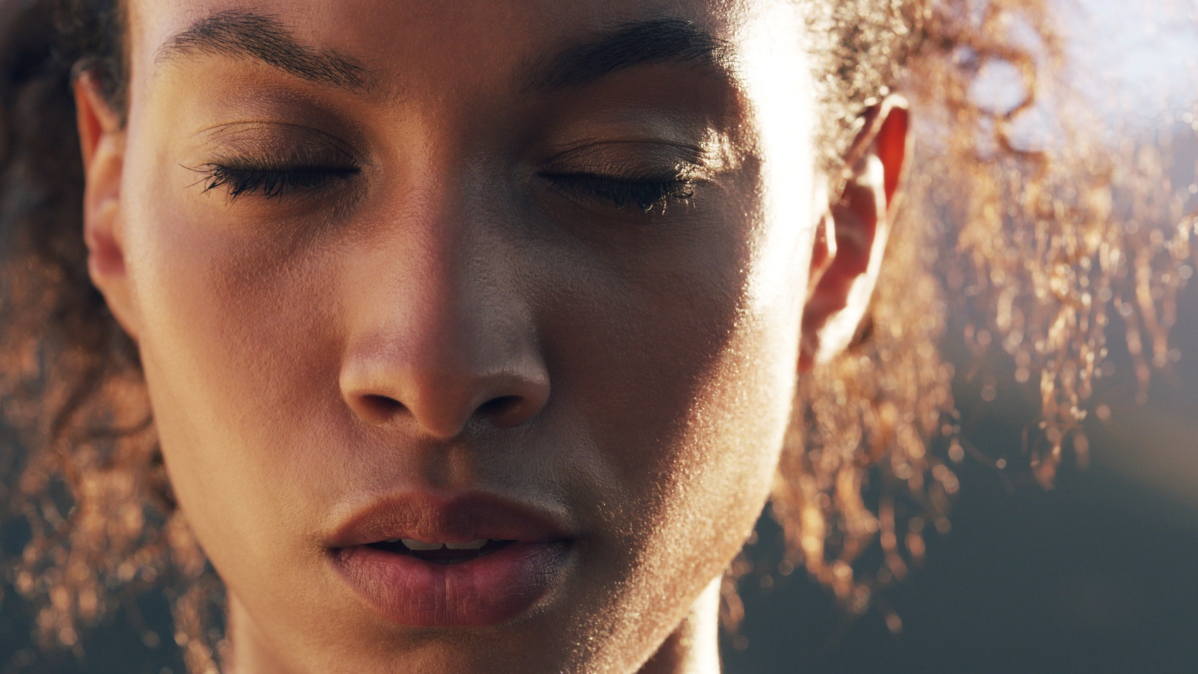 Closeup shot of a sporty woman out for a run