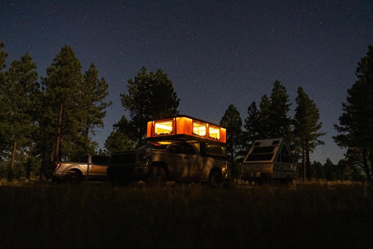The Tune M1 truck camper at night