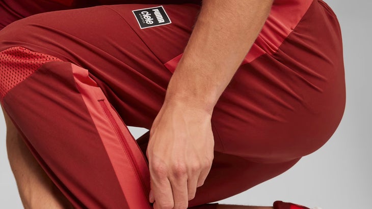 A red trackpant with a stripe