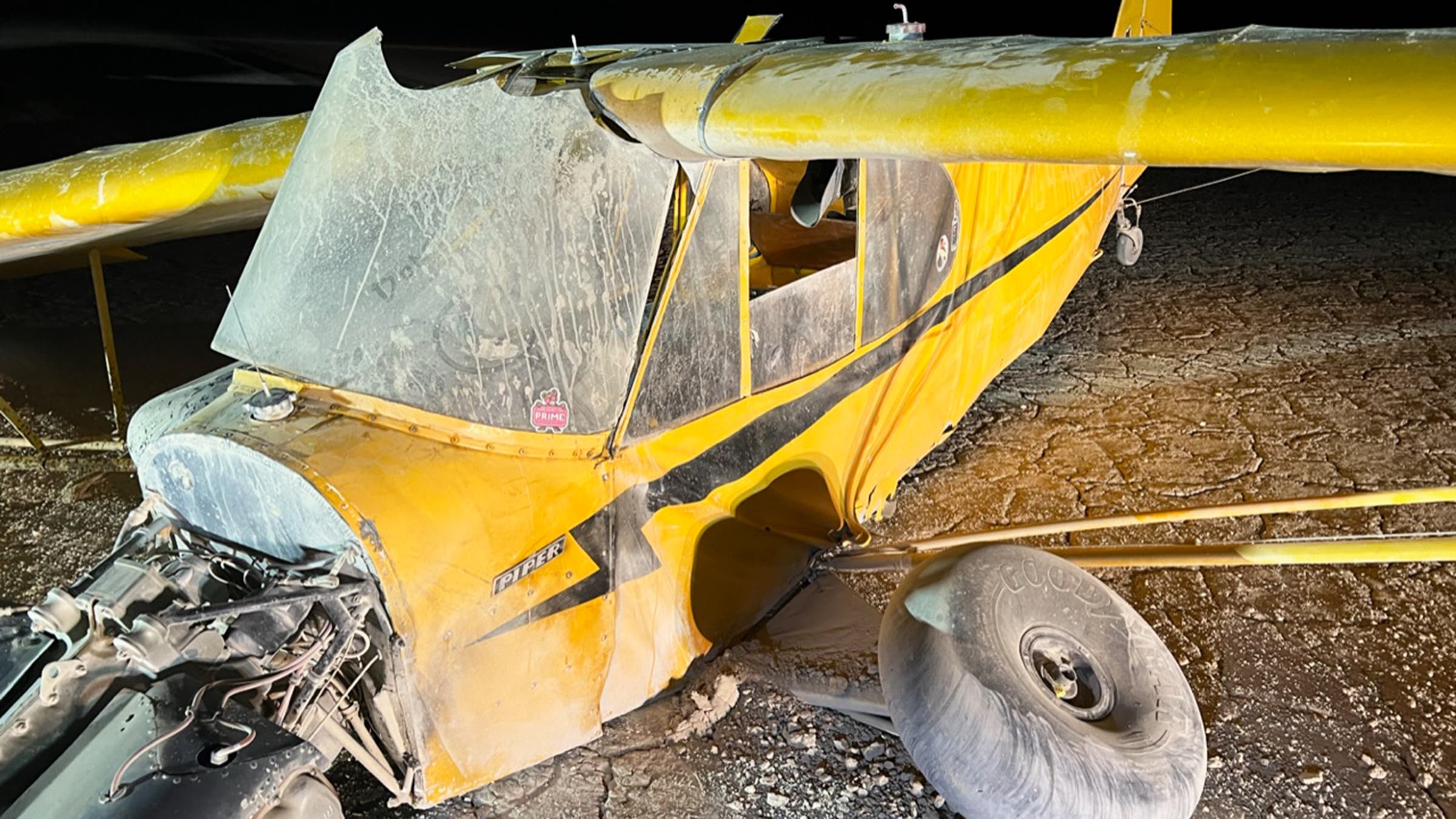 Remains of the crashed Piper J-3 Cub on the playa