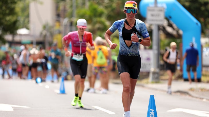 two women run in the marathon part of the ironman