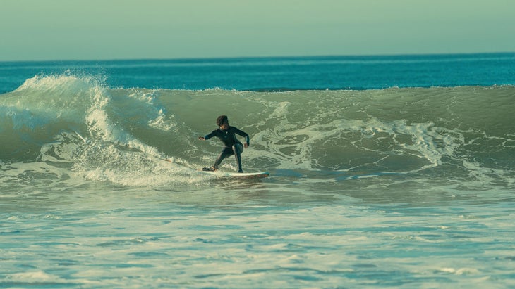 Natasha Smith surfing