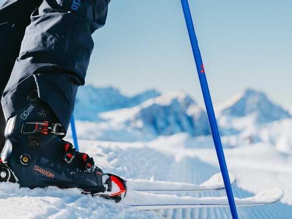 Skier wearing the Lange Shadow ski boot