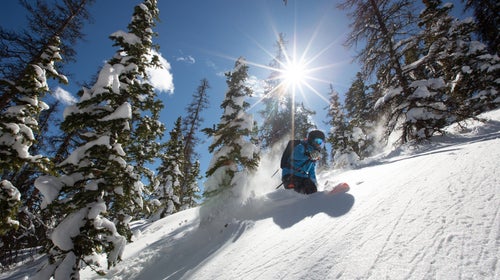 Backcountry skier wearing a pack