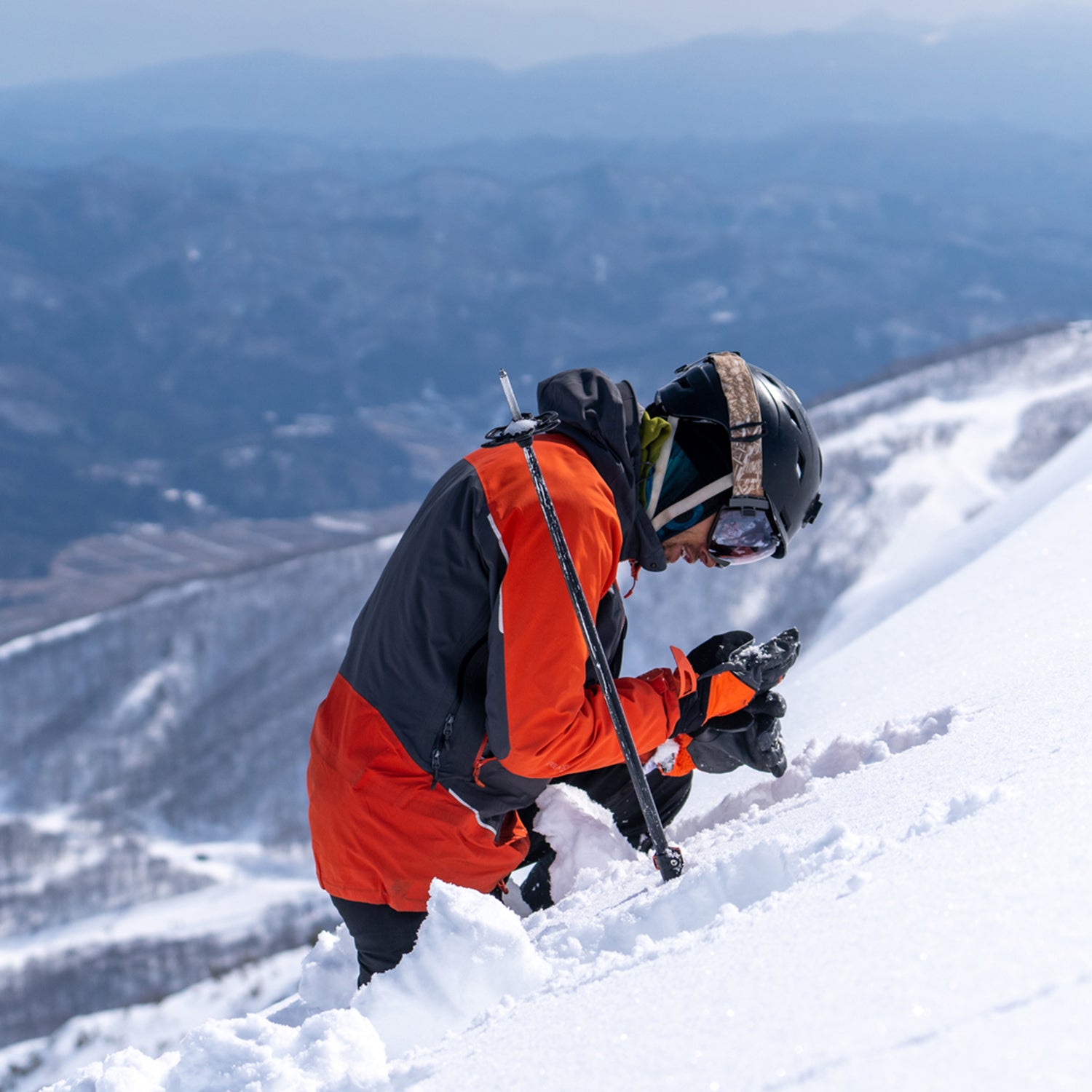 Checking the snowpack for stability before skiing down