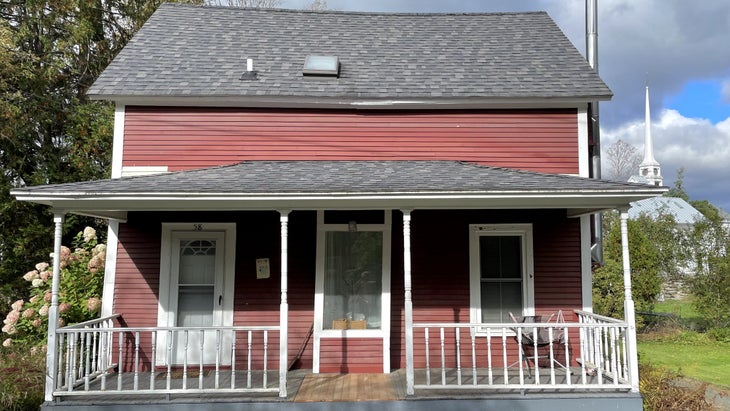 red farmhouse in stowe vermont