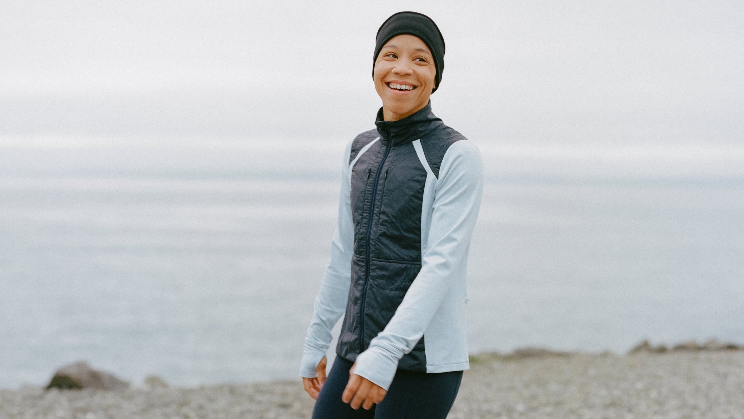 A woman runner laughing